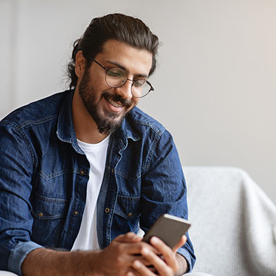 A male patient booking an online consultation with a doctor on Maple