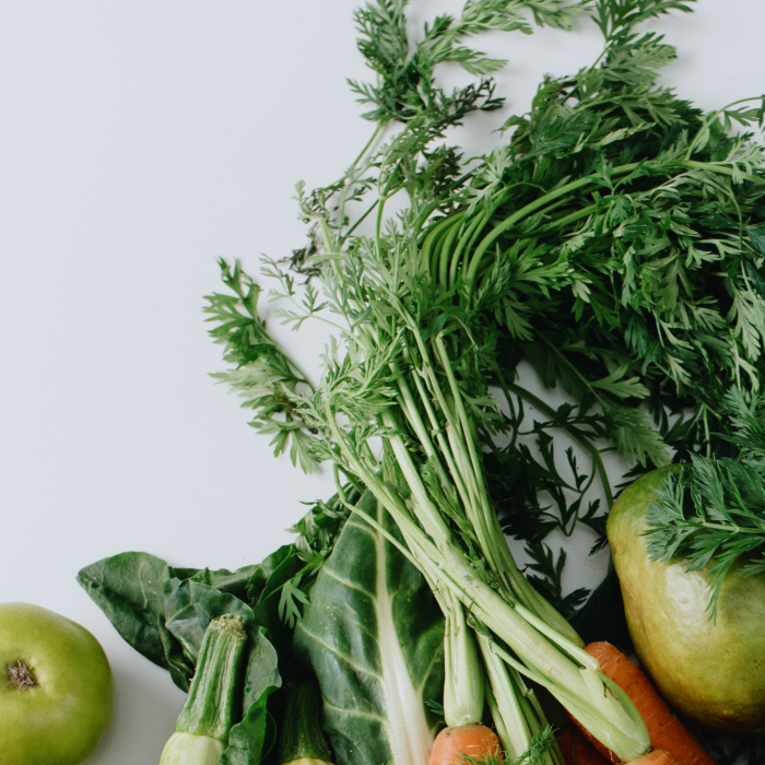 green vegetables on a grey background