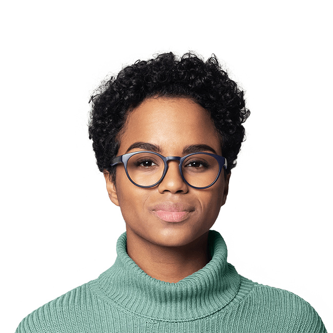 A black woman wearing glasses ready for her online consultation with an online therapist