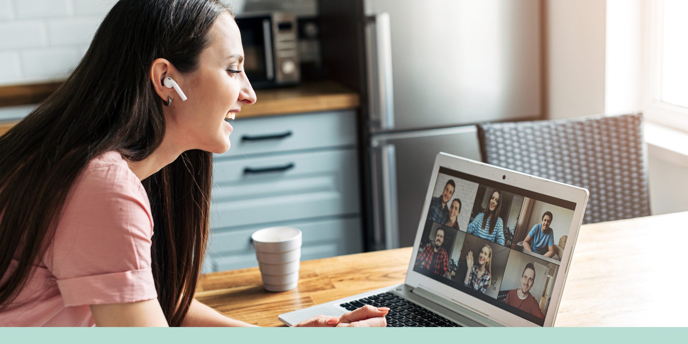 Remote worker calling her colleagues over video.