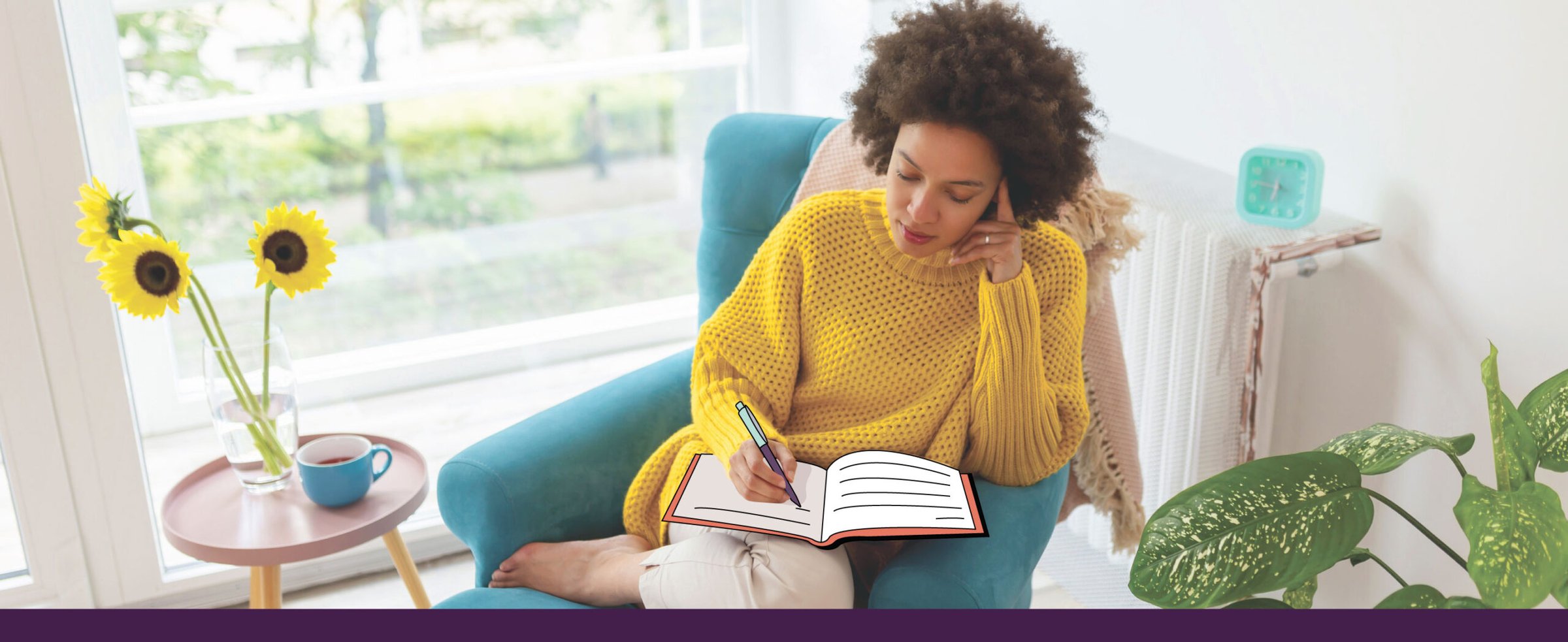Woman journaling her feelings beside a bright window.