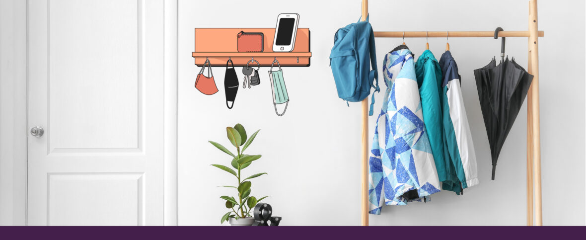A coatrack with an illustrated shelf beside holding a few face masks.