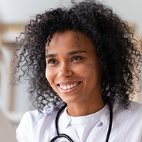 Headshot of a female doctor who takes online consultations