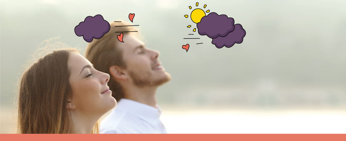 Man and woman enjoying a nice breeze outdoors, looking healthy and vital.