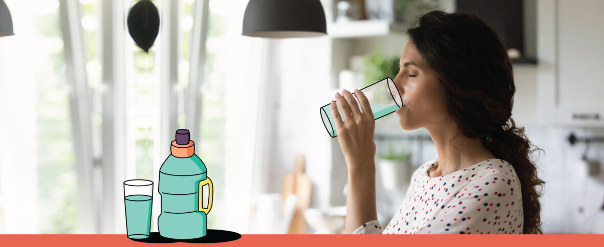 Woman drinking a glass of water.