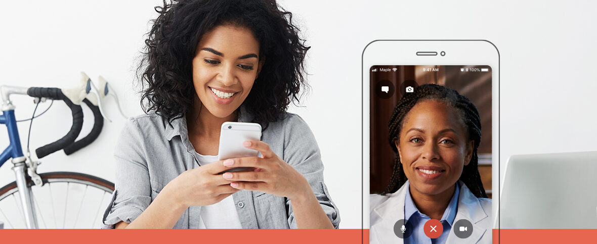 Woman smiling while looking at her phone as she talks to a virtual doctor so she can stay healthy. A phone screen with the doctor is also shown.