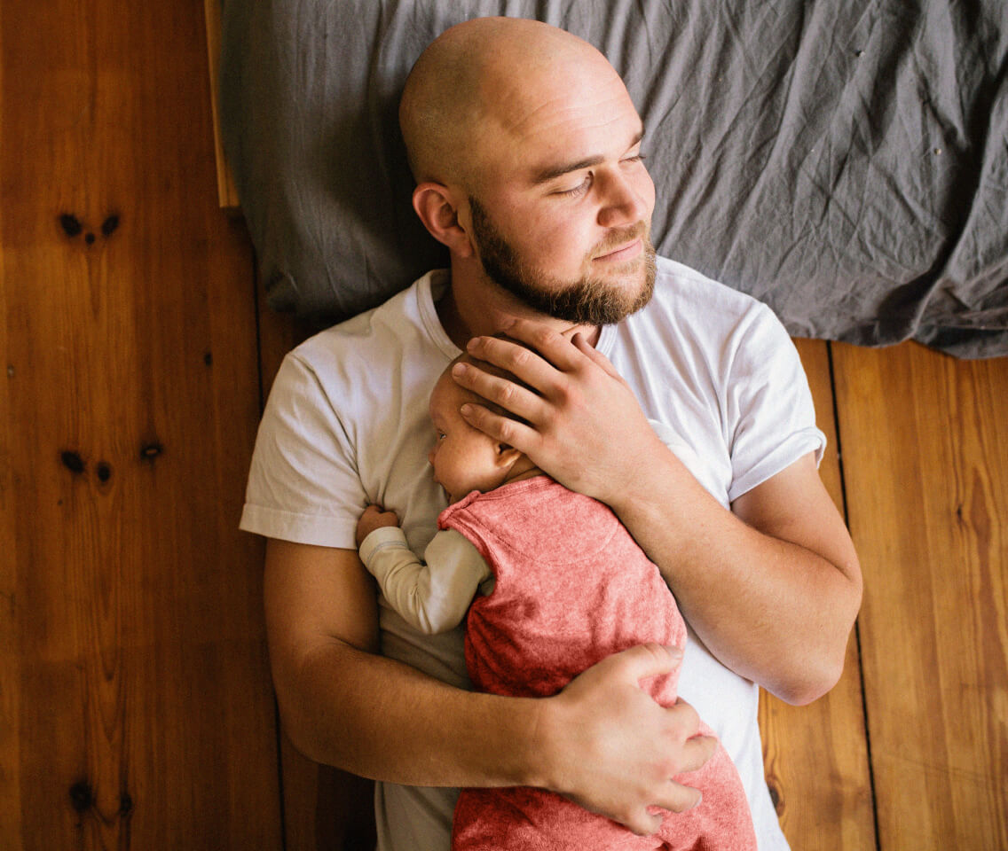 father-holding-baby